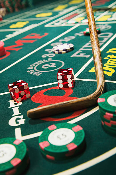 Mobile phone screen showing Sic Bo betting interface and live dealer video feed